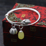 Handcrafted Silver Bracelet with Honey Amber Charm