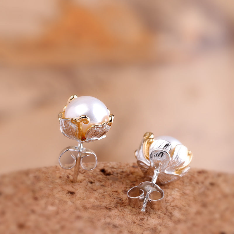 Elegant Pearl Studs with Ornate Enamel Crown