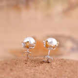 Elegant Pearl Studs with Ornate Enamel Crown