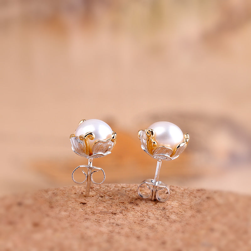 Elegant Pearl Studs with Ornate Enamel Crown