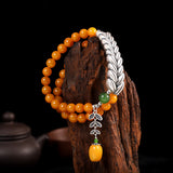 Radiant Honey Amber Bracelet with Silver Leaf Charm