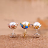 Elegant Pearl Studs with Ornate Enamel Crown