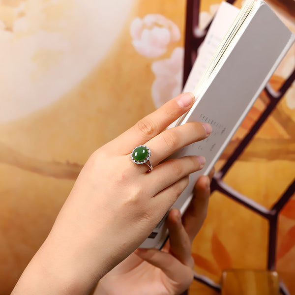 Elegant 925 Silver Jade Ring with Gem Halo