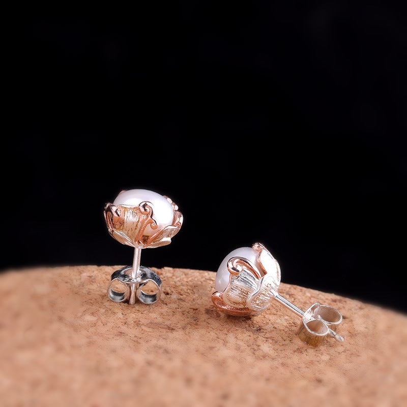 Elegant Pearl Studs with Ornate Enamel Crown