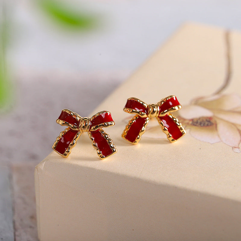 Ruby Red Bow Earrings with Gold Trim - Elegant Accessories for Women