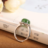 Elegant 925 Silver Jade Ring with Gem Halo