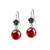 Elegant Silver Rose Earrings with Red Gem